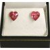 A pair of 9mm rose heart sterling silver studs.